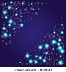 Christmas snow powder frame or border of a random scatter snowflakes on an indigo background. Snow explosion. Ice storm.