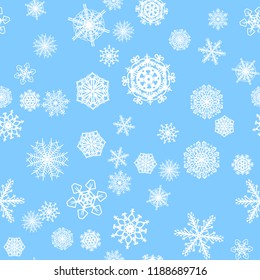 Christmas snow seamless pattern with beautiful snowflakes falling and scattered on tiled repeating ornament of winter snow