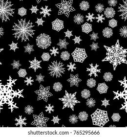 Christmas snow seamless pattern with beautiful snowflakes falling and scattered on tiled repeating ornament of winter snow