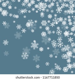 Christmas snow seasonal background with scattered snowflakes falling in winter time for New Years holidays