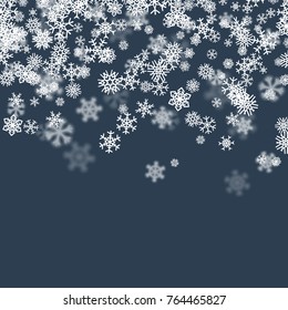 Christmas snow seasonal background with scattered snowflakes falling in winter time for New Years holidays