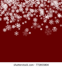 Christmas snow seasonal background with scattered snowflakes falling in winter time for New Years holidays