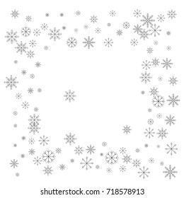 Christmas snow splash frame or border of a random scatter snowflakes isolated on white. Snow explosion. Ice storm.