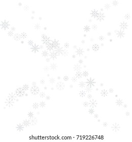 Christmas snow splash frame or border of a random scatter snowflakes isolated on white. Snow explosion. Ice storm.