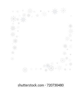 Christmas snow splash frame or border of a random scatter snowflakes isolated on white. Snow explosion. Ice storm.