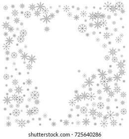 Christmas snow splash frame or border of a random scatter snowflakes isolated on white. Snow explosion. Ice storm.