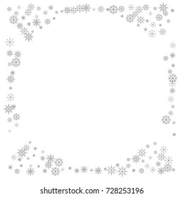 Christmas snow splash frame or border of a random scatter snowflakes isolated on white. Snow explosion. Ice storm.