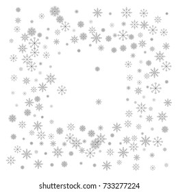 Christmas snow splash frame or border of a random scatter snowflakes isolated on white. Snow explosion. Ice storm.