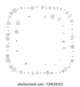 Christmas snow splash frame or border of a random scatter snowflakes isolated on white. Snow explosion. Ice storm.