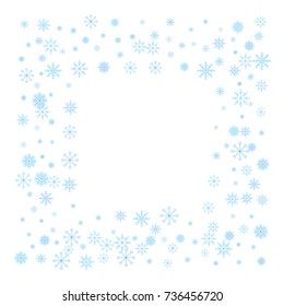 Christmas snow splash frame or border of a random scatter snowflakes isolated on white. Snow explosion. Ice storm.