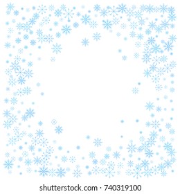Christmas snow splash frame or border of a random scatter snowflakes isolated on white. Snow explosion. Ice storm.