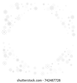 Christmas snow splash frame or border of a random scatter snowflakes isolated on white. Snow explosion. Ice storm.