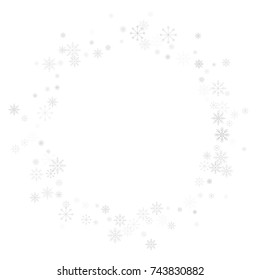 Christmas snow splash frame or border of a random scatter snowflakes isolated on white. Snow explosion. Ice storm.