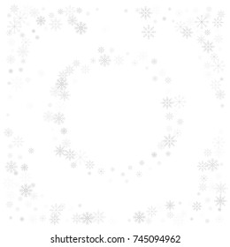 Christmas snow splash frame or border of a random scatter snowflakes isolated on white. Snow explosion. Ice storm.