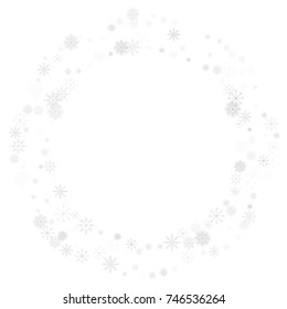 Christmas snow splash frame or border of a random scatter snowflakes isolated on white. Snow explosion. Ice storm.