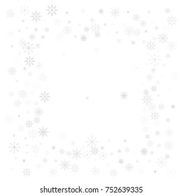 Christmas snow splash frame or border of a random scatter snowflakes isolated on white. Snow explosion. Ice storm.