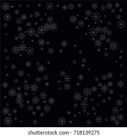 Christmas snow spray background of a random scatter snowflakes isolated on black. Snow explosion. Ice storm.