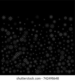 Christmas snow spray background of a random scatter snowflakes isolated on black. Snow explosion. Ice storm.