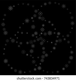 Christmas snow spray background of a random scatter snowflakes isolated on black. Snow explosion. Ice storm.