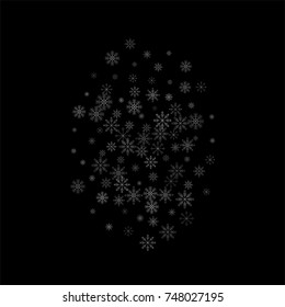 Christmas snow spray background of a random scatter snowflakes isolated on black. Snow explosion. Ice storm.