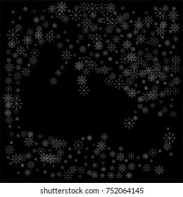 Christmas snow spray background of a random scatter snowflakes isolated on black. Snow explosion. Ice storm.
