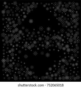 Christmas snow spray background of a random scatter snowflakes isolated on black. Snow explosion. Ice storm.