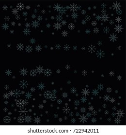 Christmas snow spray frame or border of a random scatter snowflakes isolated on black. Snow explosion. Ice storm.