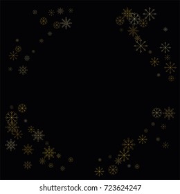 Christmas snow spray frame or border of a random scatter snowflakes isolated on black. Snow explosion. Ice storm.