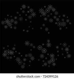 Christmas snow spray frame or border of a random scatter snowflakes isolated on black. Snow explosion. Ice storm.