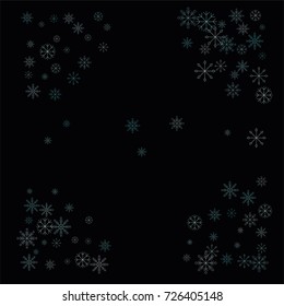 Christmas snow spray frame or border of a random scatter snowflakes isolated on black. Snow explosion. Ice storm.