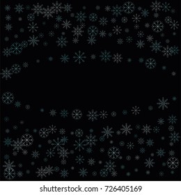 Christmas snow spray frame or border of a random scatter snowflakes isolated on black. Snow explosion. Ice storm.