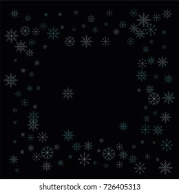 Christmas snow spray frame or border of a random scatter snowflakes isolated on black. Snow explosion. Ice storm.