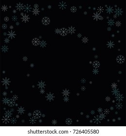 Christmas snow spray frame or border of a random scatter snowflakes isolated on black. Snow explosion. Ice storm.