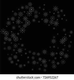 Christmas snow spray frame or border of a random scatter snowflakes isolated on black. Snow explosion. Ice storm.