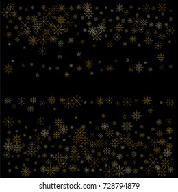 Christmas snow spray frame or border of a random scatter snowflakes isolated on black. Snow explosion. Ice storm.