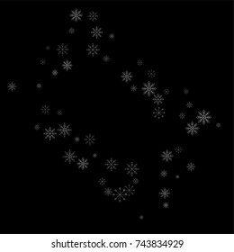 Christmas snow spray frame or border of a random scatter snowflakes isolated on black. Snow explosion. Ice storm.