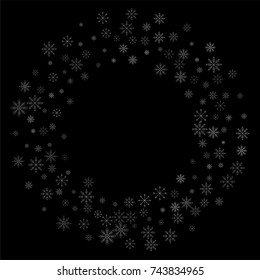Christmas snow spray frame or border of a random scatter snowflakes isolated on black. Snow explosion. Ice storm.