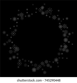 Christmas snow spray frame or border of a random scatter snowflakes isolated on black. Snow explosion. Ice storm.