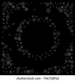 Christmas snow spray frame or border of a random scatter snowflakes isolated on black. Snow explosion. Ice storm.