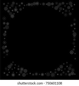 Christmas snow spray frame or border of a random scatter snowflakes isolated on black. Snow explosion. Ice storm.