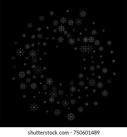 Christmas snow spray frame or border of a random scatter snowflakes isolated on black. Snow explosion. Ice storm.