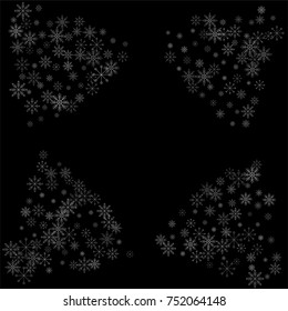 Christmas snow spray frame or border of a random scatter snowflakes isolated on black. Snow explosion. Ice storm.