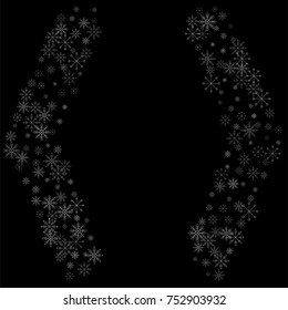 Christmas snow spray frame or border of a random scatter snowflakes isolated on black. Snow explosion. Ice storm.