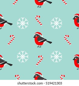 Christmas snowflake candy cane, bullfinch bird wearing red santa hat. Seamless Pattern Decoration. Wrapping paper, textile template. Blue background. Flat design. Vector illustration.