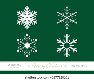 Christmas snowflake icon set of 4 designs on green background