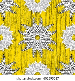 Christmas, snowflake, new year. Vintage pattern on yellow background with white elements.