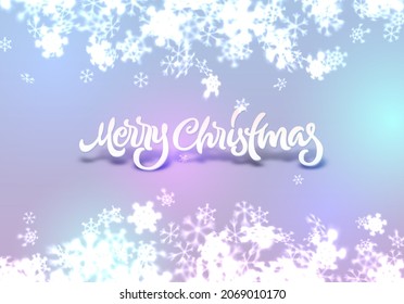 Christmas snowflakes background with falling snow and lettering or calligraphic greeting text