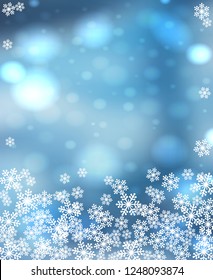 Christmas snowflakes blank frame vector illustration. Greeting card winter light blue background with bokeh lights and copy space. Vertical format.