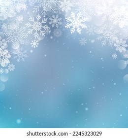 Christmas Snowflakes Blurred Background. Winter blue sky with falling snow, snowflake. Christmas snow surface. Christmas Snowflakes Shining