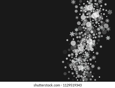 Christmas snowflakes on black background. New year. Horizontal Christmas snowflakes frame for holiday banners, cards, sales, special offers. Falling snow with bokeh and flakes for party celebration